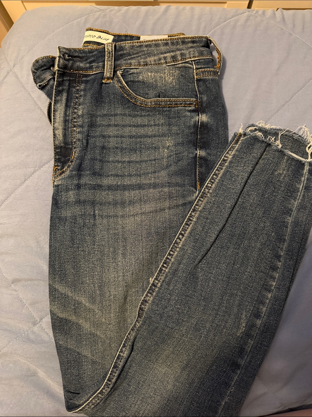 Women’s Dark Blue Skinny Jeans with Frayed Hem